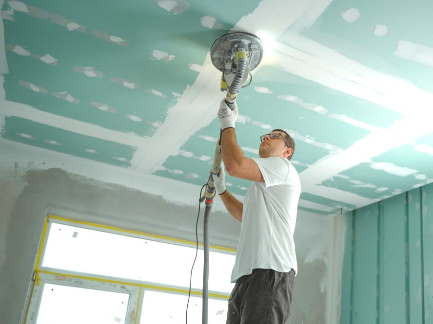 Man Polishing the Ceiling